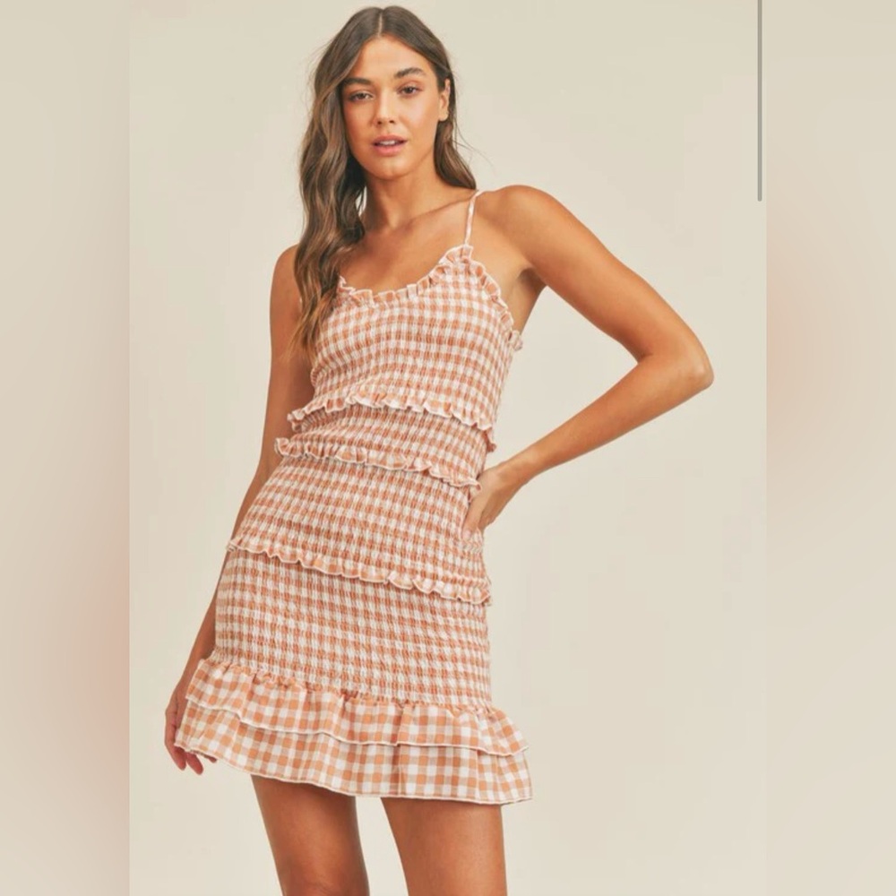 salmon pink smocked ruffle mini dress. Gingham pattern. Size small.